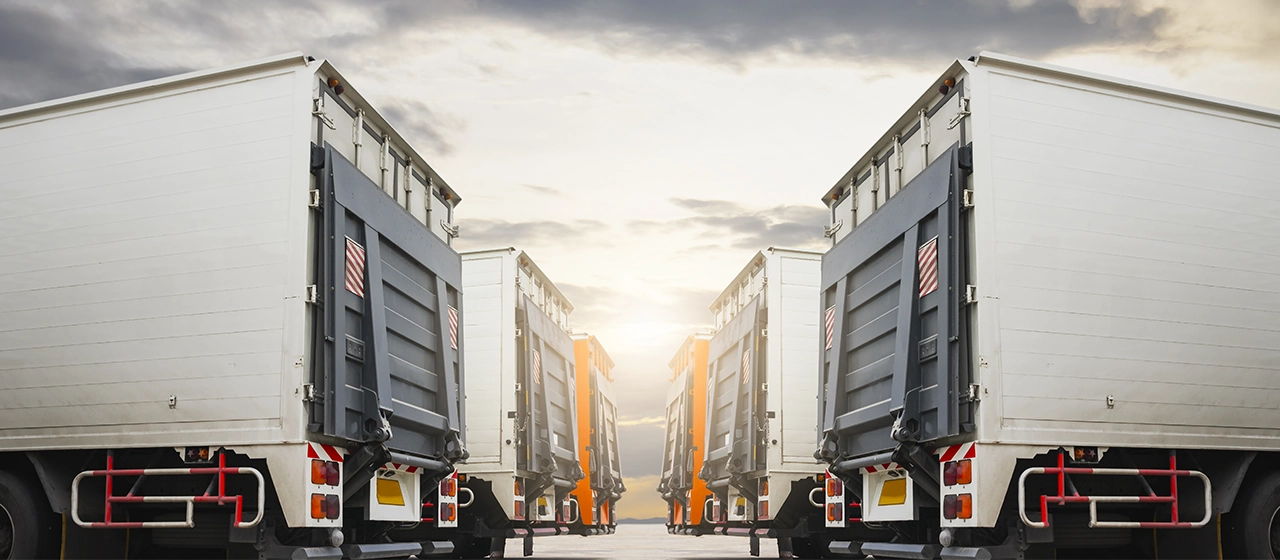 A row of ramp trucks waiting to be released.