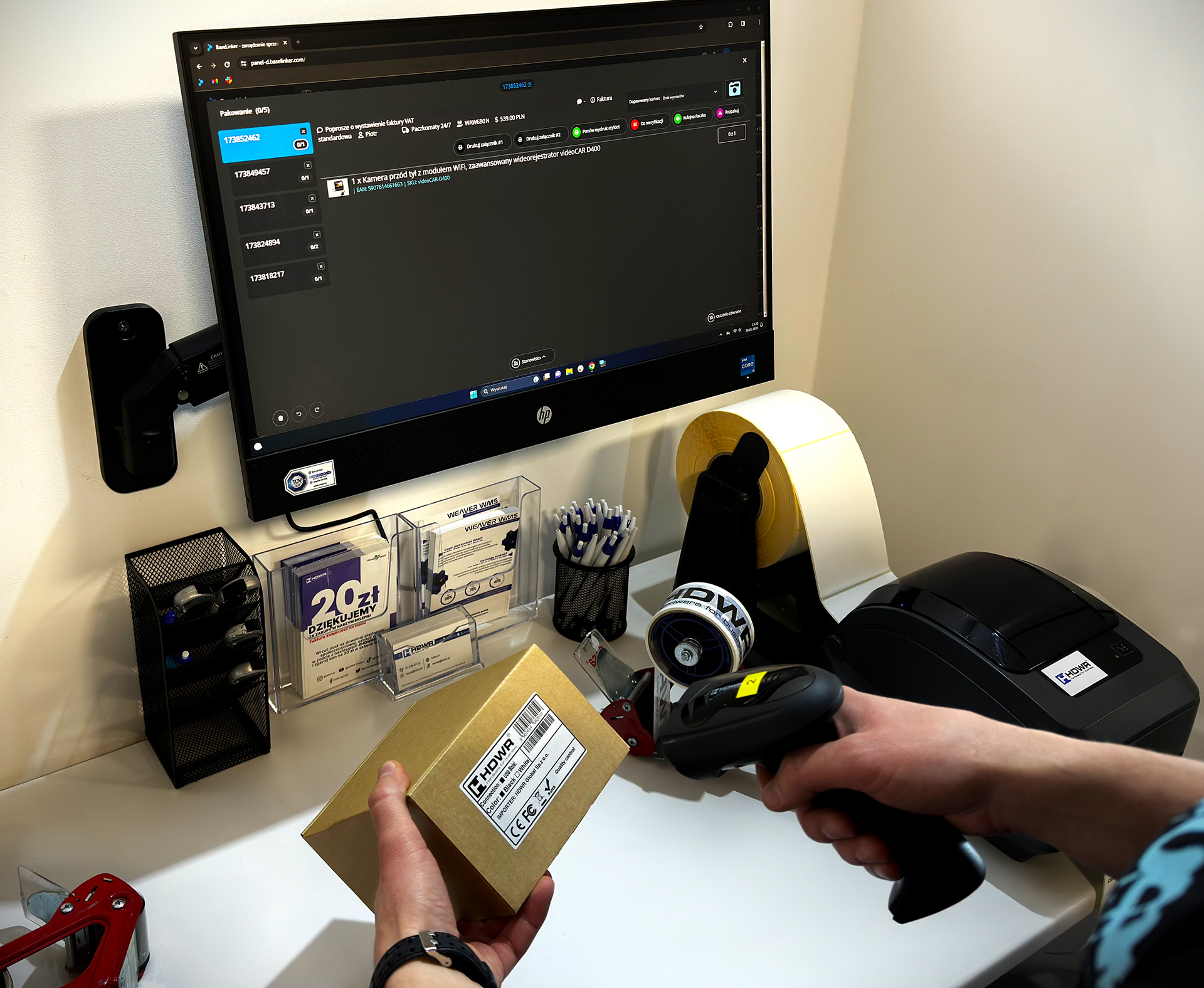 Packing a package at the BaseLinker booth